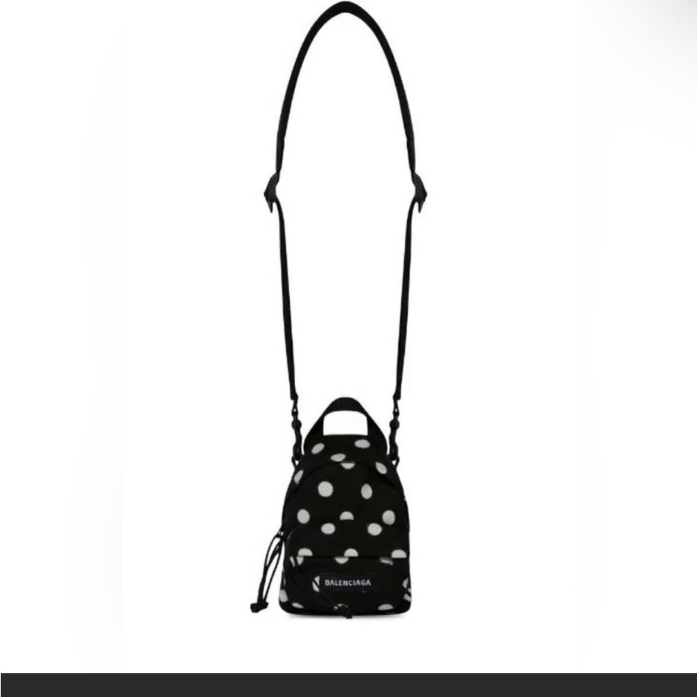 Balenciaga mini back pack in polka dot. Brand new comes with receipt from saks.